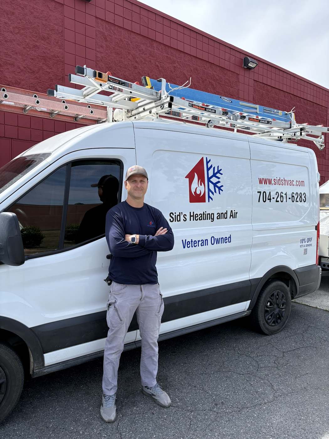 Sid's Heating and Air veteran-owned service van on a job in Monroe NC
