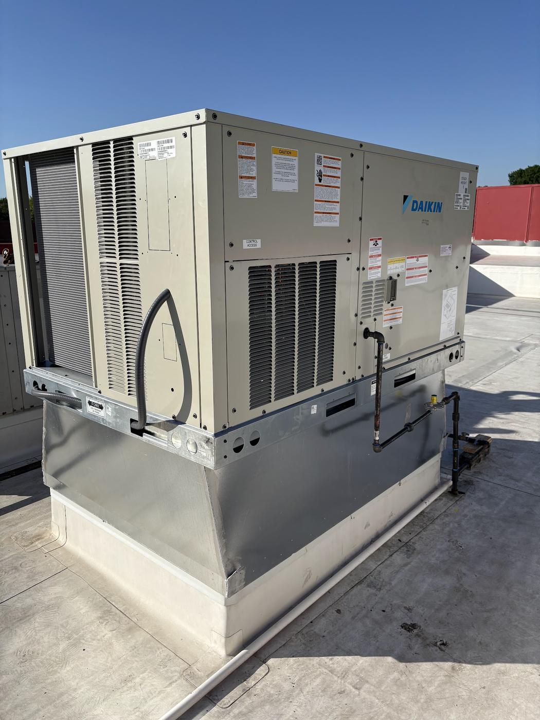 Rooftop packaged heating and cooling unit