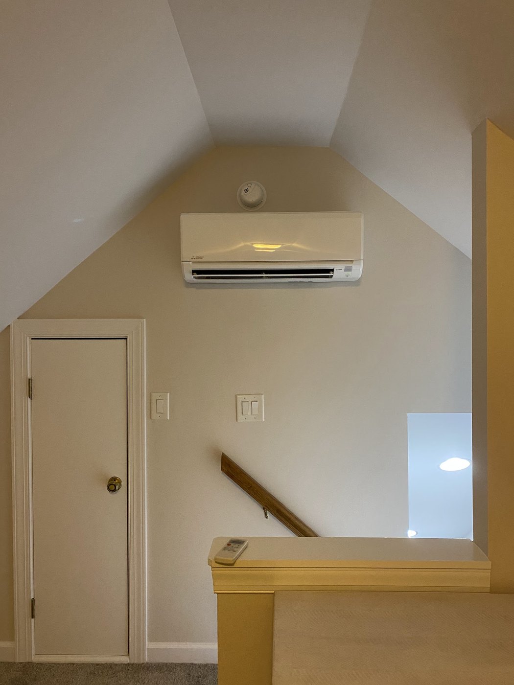 Ductless mini-split head serving an upstairs bonus room