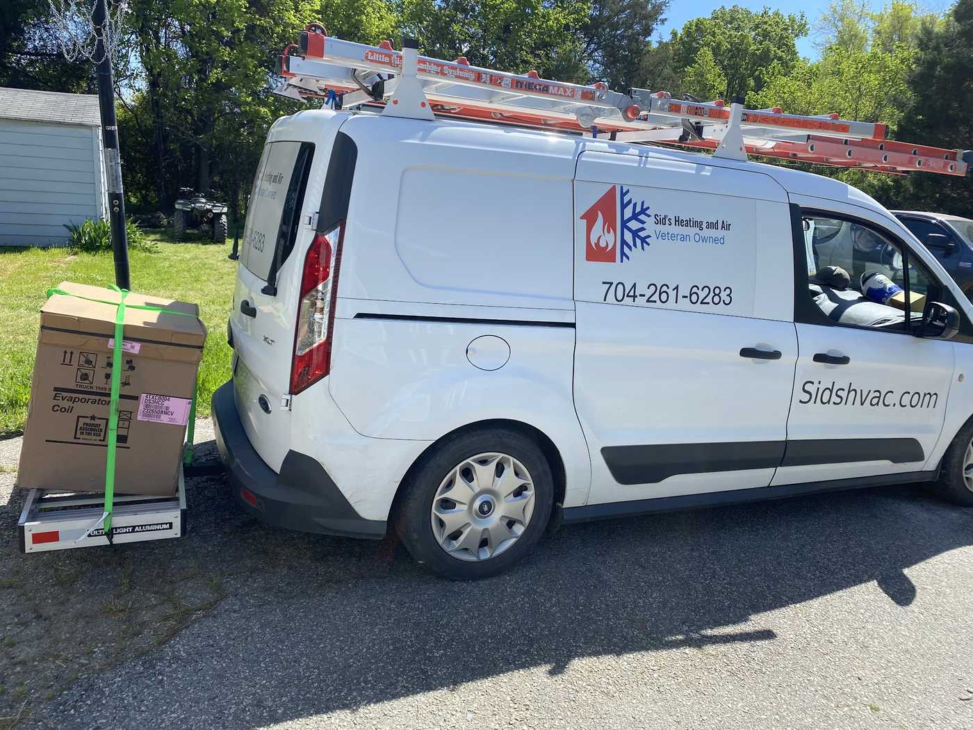 New HVAC equipment delivered to a job in the service van