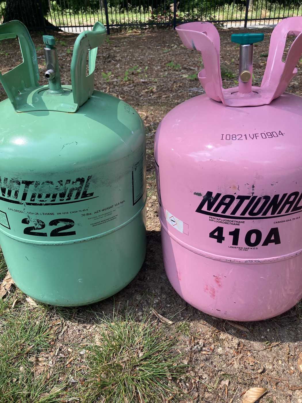 R-22 and R-410A refrigerant cylinders on a job site