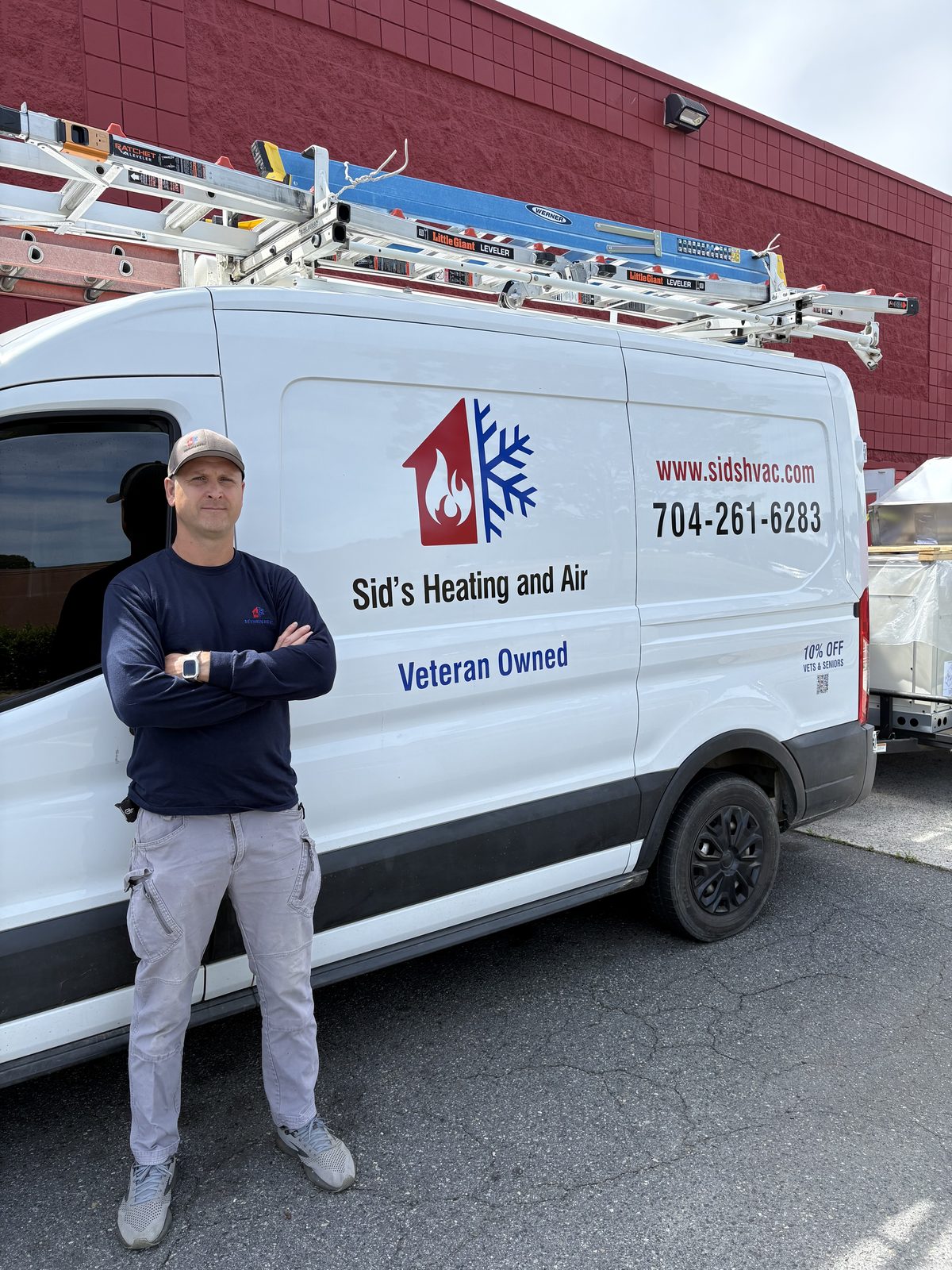 Sid Sidorin with the Sid's Heating & Air service van in Monroe, NC